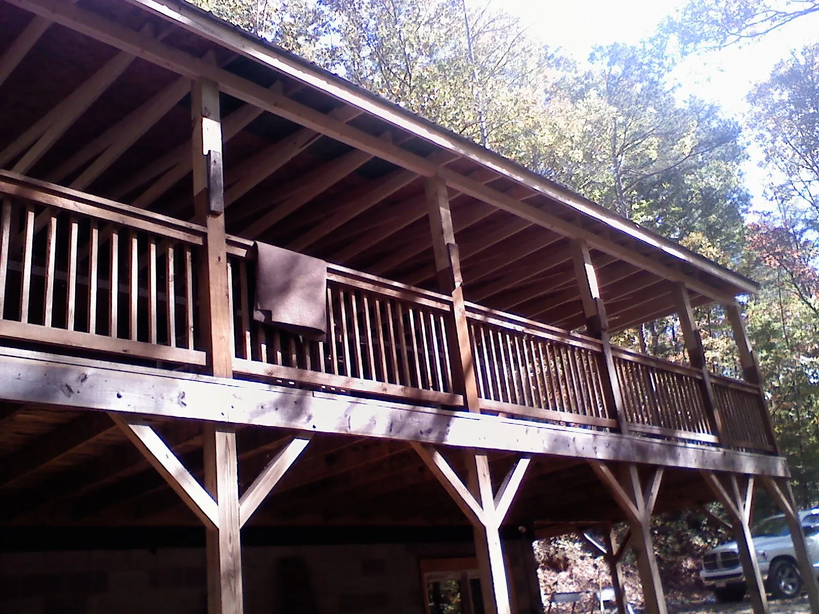 Timber framing under a new elevated porch and deck — Roof Leak Repair in Wallingford by Roofing Brothers